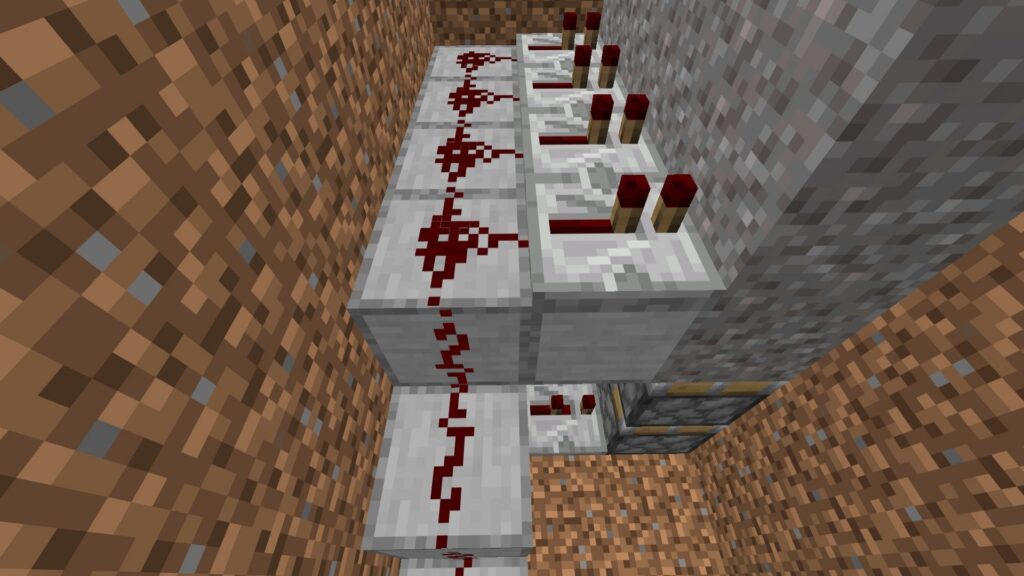 🔥 Redstone torch wiring system inside a Minecraft Automated Castle Gate