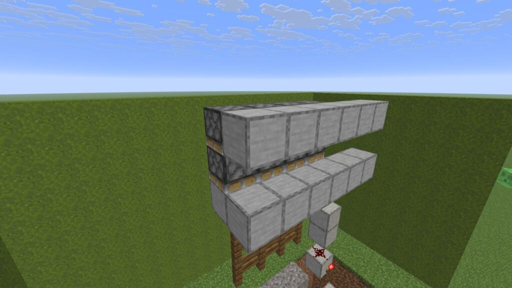 🧱 Upper smooth stone platforms supporting a Minecraft Automated Castle Gate mechanism