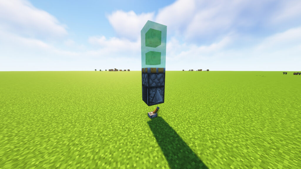 Two slime blocks attached to a sticky piston in a Minecraft Flying Machine