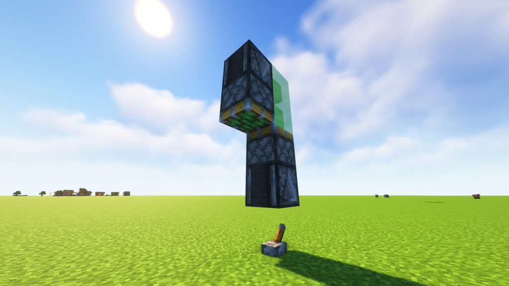 Second observer placed beside the top slime block in a Minecraft Flying Machine